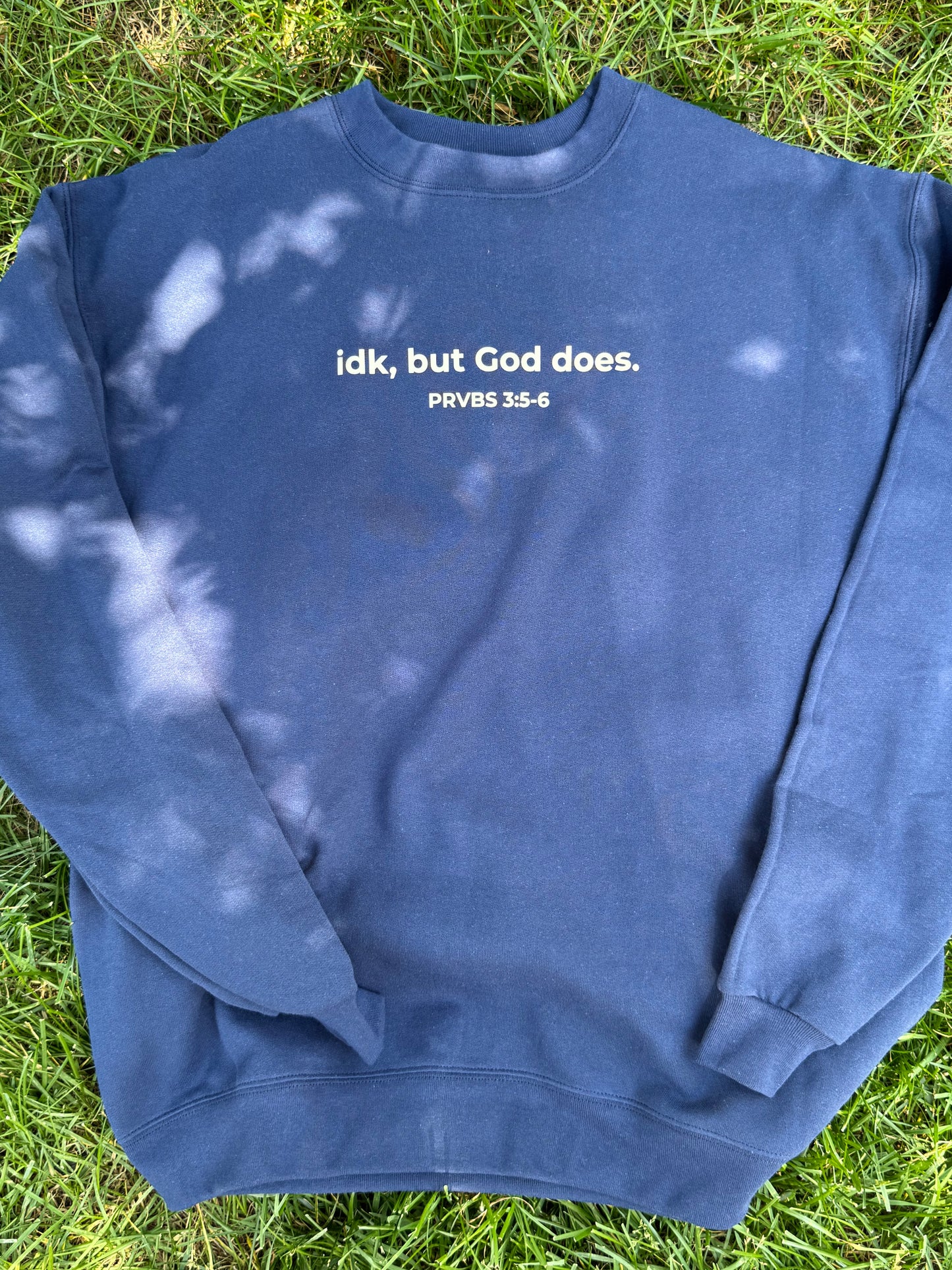idk, but God does. Crew Neck