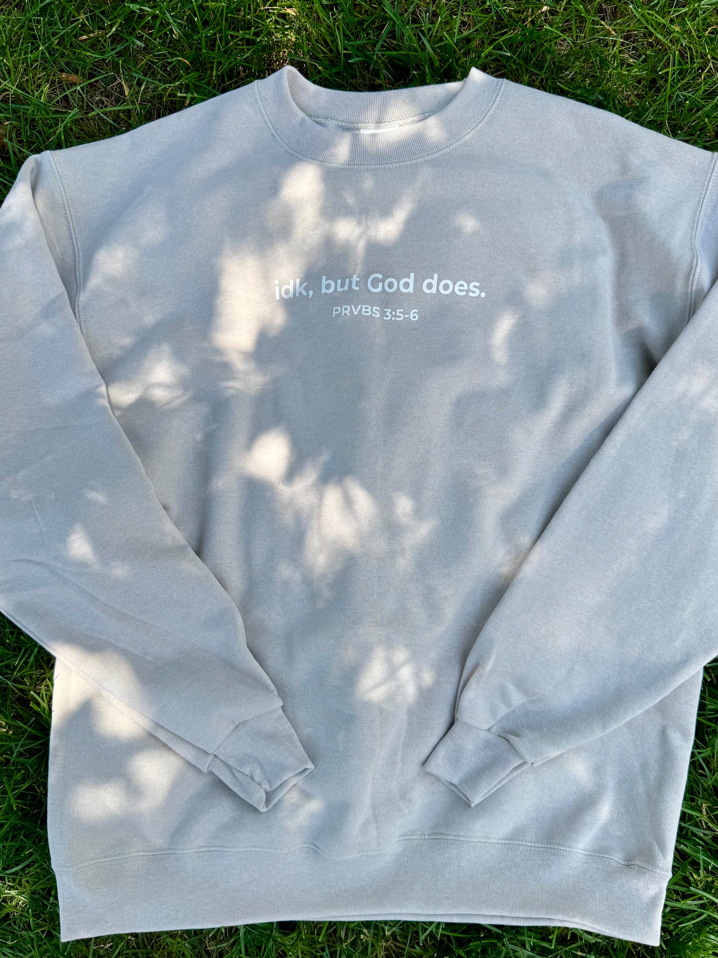 idk, but God does. Crew Neck