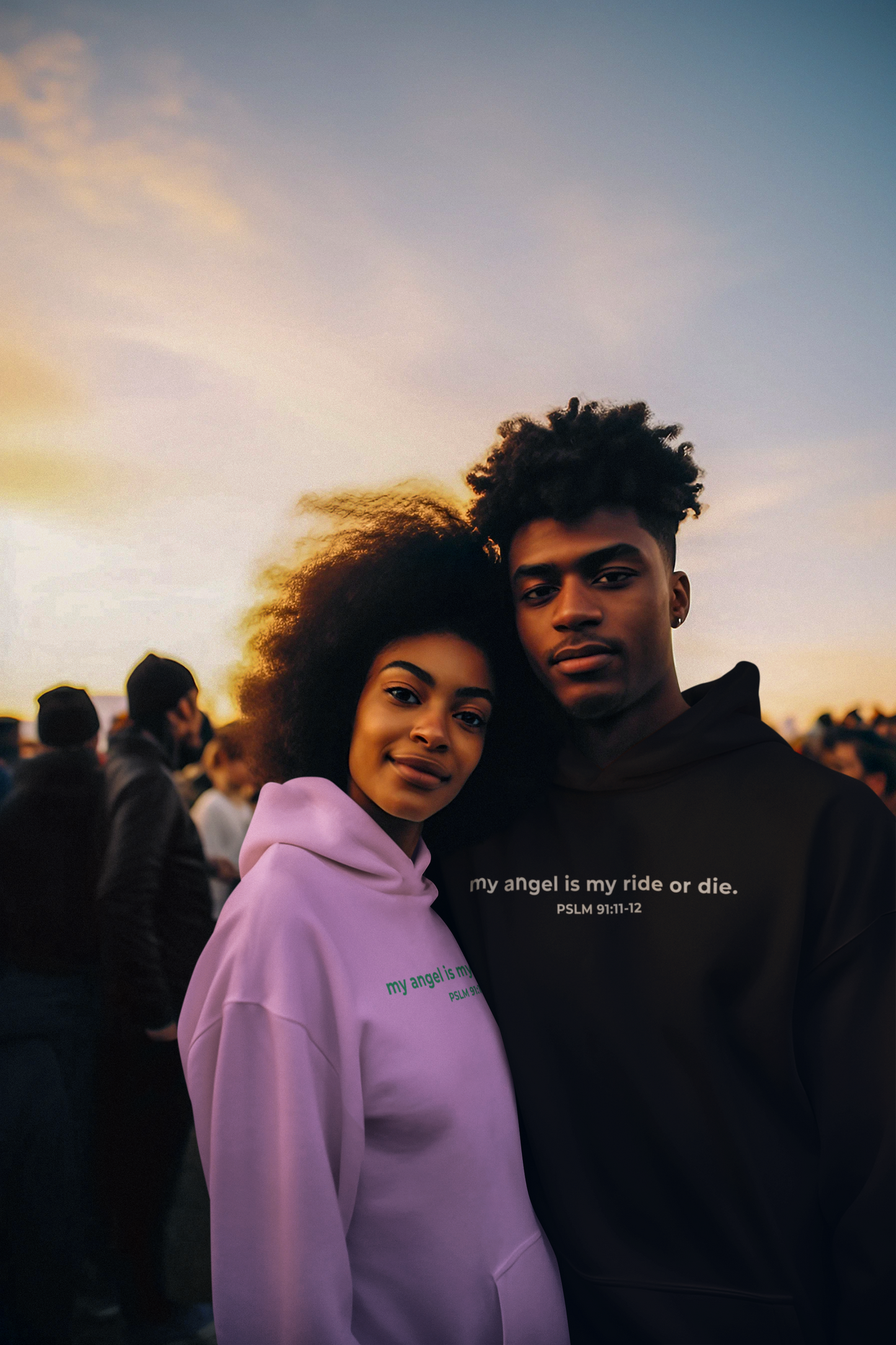 young man and woman at a festival posting in my angel is my ride or die hoodies